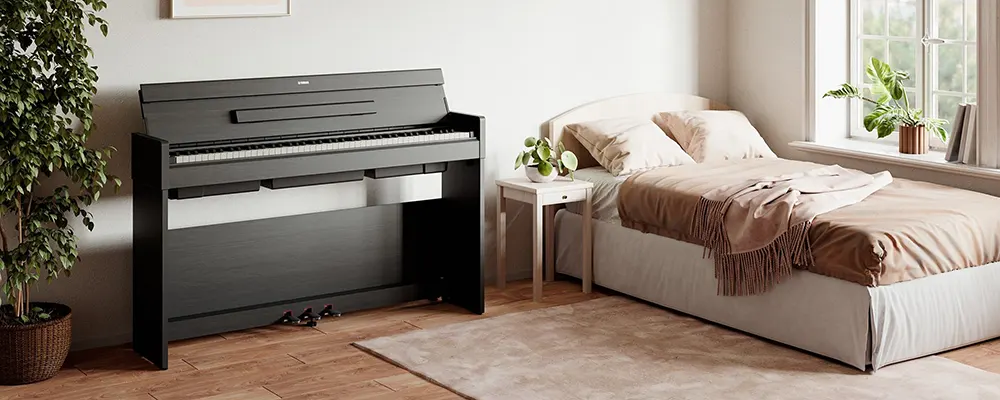 Piano de iniciación Yamaha Arius YDP S35 Negro en dormitorio